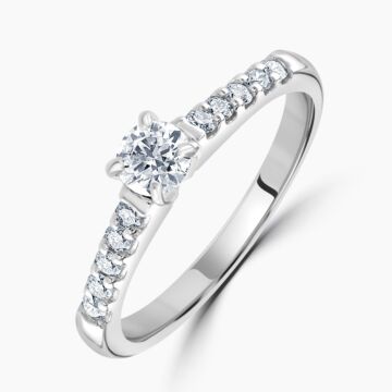 Platinum round brilliant cut diamond single stone ring with diamond shoulders. GIA cert. Diamond=0.23ct. F colour, SI2 clarity. Shoulders=0.21ct. Total=0.43ct.