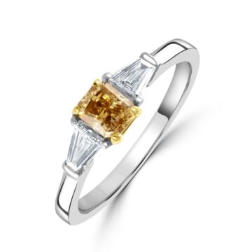Platinum cut corner rectangular natural fancy brownish yellow diamond. GIA certificated, VVS2 clarity, 0.40carat, 3 stone ring with 0.25carat tapered baguette shoulders. Total diamond weight =0.65carat.